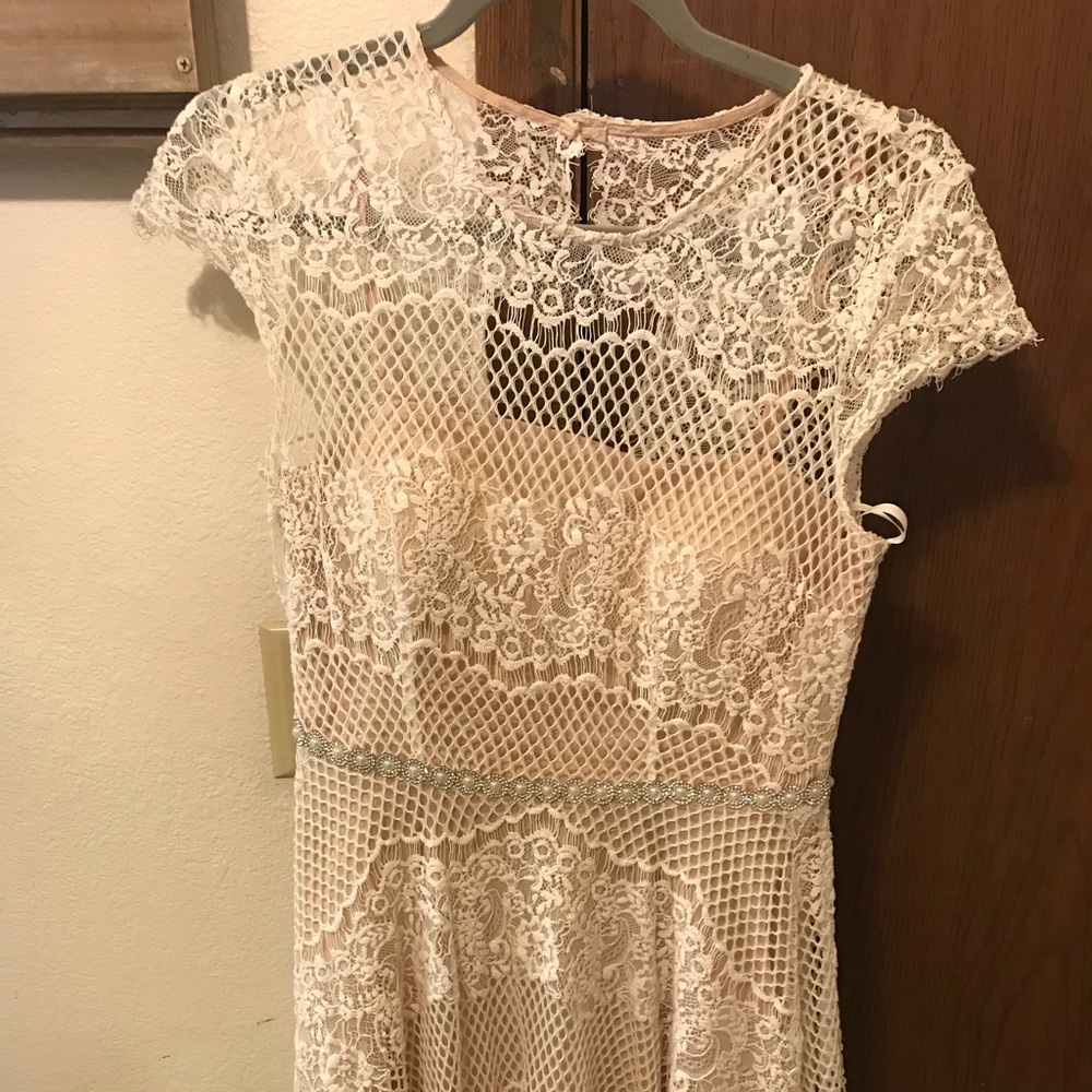 Short cap sleeve lace dress with beaded waist